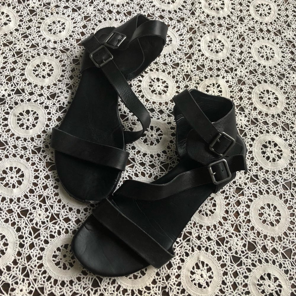 Black strappy buckle sandals